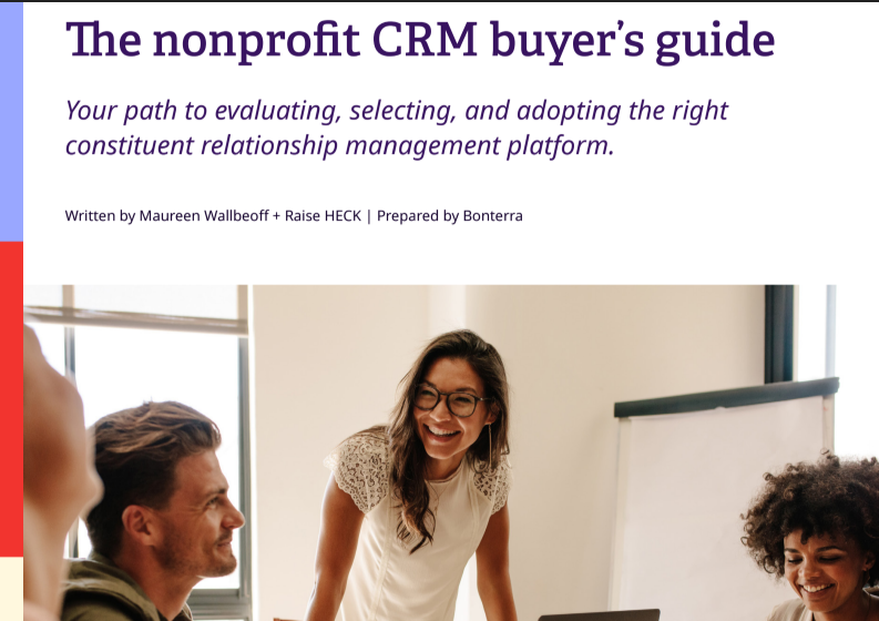 Thumbnail of people with computers at a work conference room laughing and having a great time buying nonprofit software